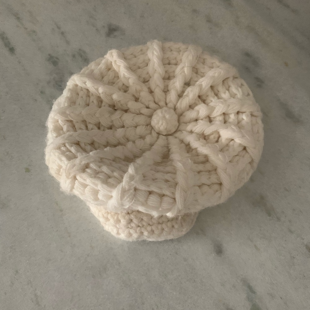 A small, knitted hat.